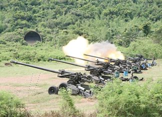 The Thai Navy tests a new weapons-targeting system, firing artillery rounds towards Koh Rin.